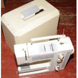 A cased Bernina 1020 sewing machine. Includes foot pedal and base plate.Condition report intended as