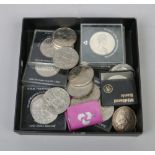 A collection of British commemorative coins to include Crowns, five shillings etc.