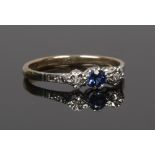 A 9ct gold and platinum sapphire and diamond 3 stone set ring size Q 1/2.Condition report intended