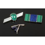 Two silver and hardstone brooches including malachite and lapis lazuli along with a silver and