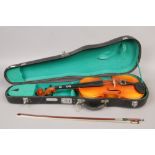 A cased Skylark full size violin and bow.