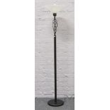 A painted steel uplighter / standard lamp with stylised top and marbleised shade.