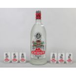 A bottle of Russian Youri Dolgoruki Vodka 1.75l along with a matching set of six shot glasses.