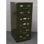A 1940s green painted steel filing cabinet.