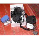 A collection of digital cameras and camcorders to include Samsung camcorder 34 x optical zoom,