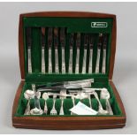 A cased Oneida canteen of stainless steel cutlery, approximately 65 pieces.