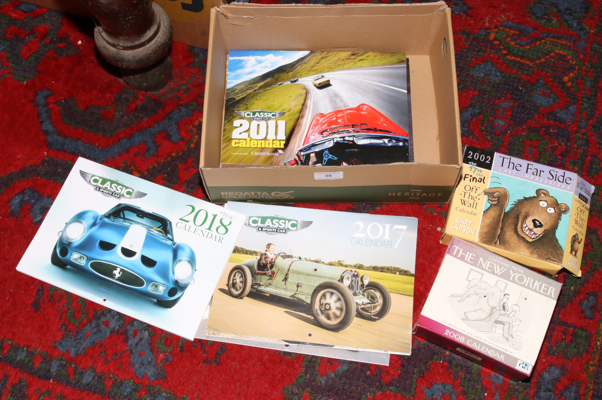 Ten classic and sports car calendars 2001 -2008 along with two desk calendars The Farside Last