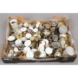 A box containing a large collection of pocket and wristwatch movements including 19th century