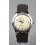 A gentleman's vintage Favre - Leuba Geneve manual daymatic wristwatch with date display and baton