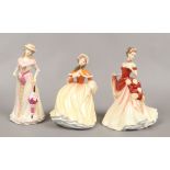 Three Royal Doulton figures from the Pretty Ladies collection Spring HN5321 Autumn Ball HN5465 and