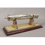 A silver Burman scroll holder on stand, in-scripted to Mr & Mrs H. F. Ferguson.