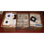 Three boxes of 45rpm singles to include ABBA, Cliff Richard, Kylie Minogue, Village People, Cher