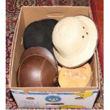 A box of hats, milliners wood blocks and hat stand to include jockeys helmet, bowler hat, pith