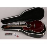 An Ovation legend LX acoustic guitar model number 1777LX round back in hardback case and