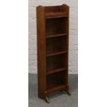 A mahogany slender open bookcase, 117cm x 38cm x 21cm.