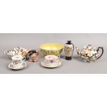 A quantity of collectable ceramics including a Ruskin bowl, a small satsuma baluster vase on