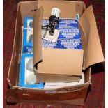 An unopened box of 10 terrier thermostatic sensor heads, along with a box of tip heads.