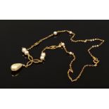 A 9ct gold and faux pearl necklet.