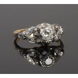 An Art Deco 18ct gold and platinum diamond solitaire ring, stone approximately .25ct size N.