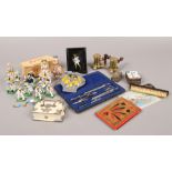 A case of collectables to include silver matchbox holder, novelty cruets, AA badge, cased