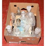 A box of glass decanters to include cut examples etc.