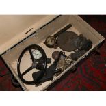 A brass bound travel trunk and contents of vintage pressure gauges, coach lamps, Salter scales and