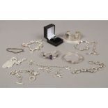 A collection of silver jewellery all stamped 925 to include bangles, charm bracelet, rings etc.