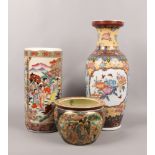 A collection of decorative oriental ceramics to include two large vases, one decorated with