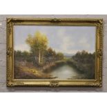 A large gilt framed oil on canvas, river landscape signed Koenig 59.75 x 90.5cm.