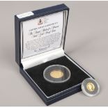 Two gold commemorative coins for the royal birth of a princess, with certificate of authenticity