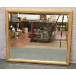 A large ornate gilt frame bevel edge wall mirror (122cm X 100cm)