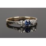 A 9ct gold sapphire and diamond 3 stone ring, size R.