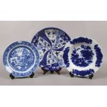 Three blue and white plates including a Japanese transfer printed example.