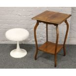 A mahogany two tier occasional table, along with an upholstered top stool.