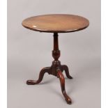 A Georgian mahogany snap top wine table of very small proportions (damaged).Condition report