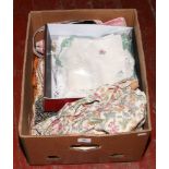 A box of linen and sewing equipment etc.