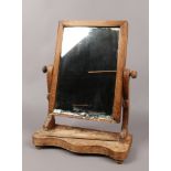 A Victorian oak toilet mirror, for repair.