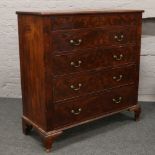 A Victorian mahogany large chest of five drawers with top secret drawer raised on bracket feet,