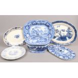 A quantity of mostly 19th century blue and white dinnerwares including serving plates and soup