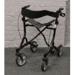 A folding mobility walker / seat.