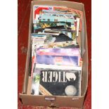 A box lot of loose stamps, collectors guides and colour postcards.