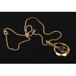 A 9ct gold and amethyst modernist pendant on chain. (Length of chain 43cm, Pendant Size 4cm X 2.3cm,