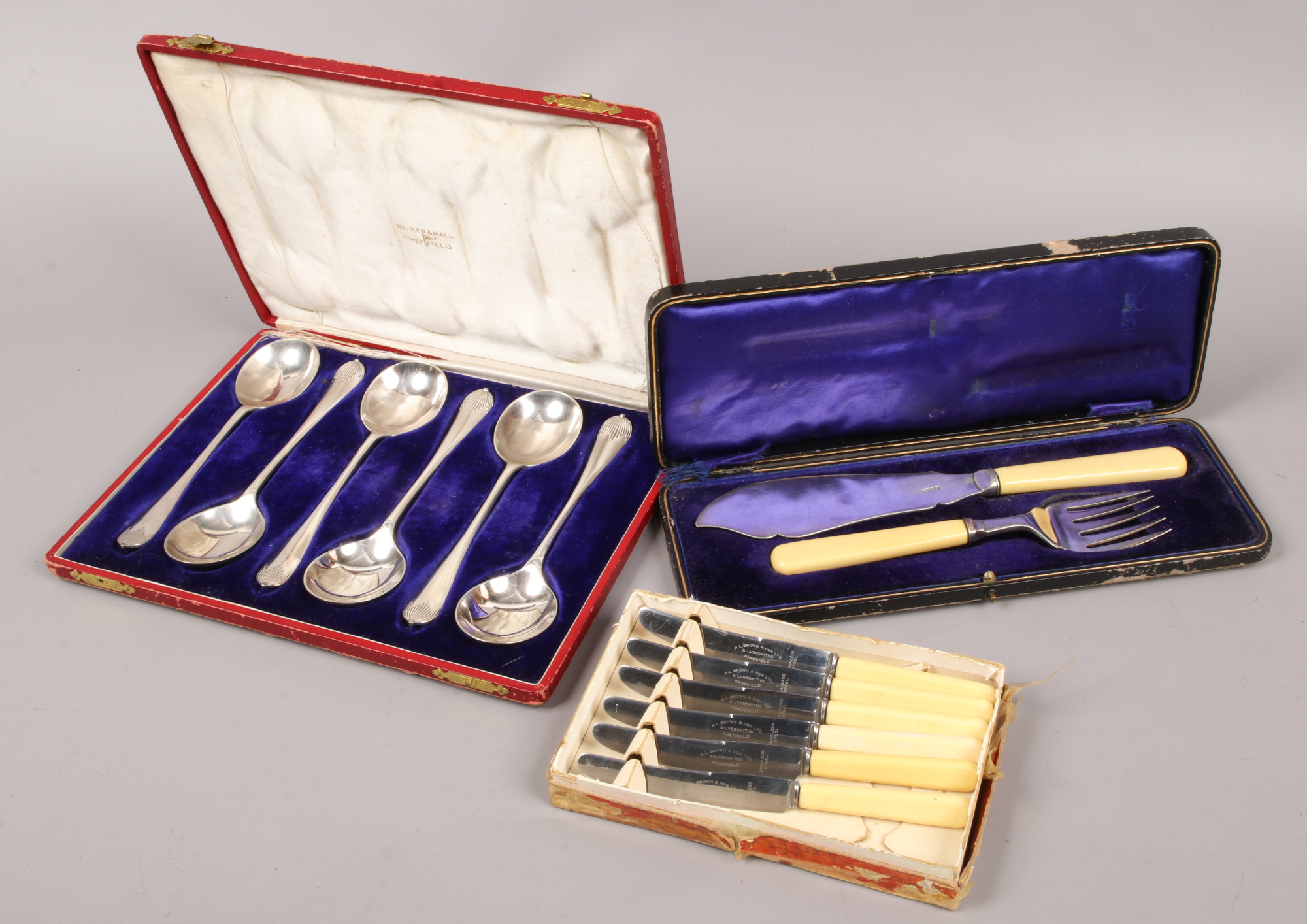 A Walker & Hall cased set of six silver plated soup spoons, along with cased fish servers and