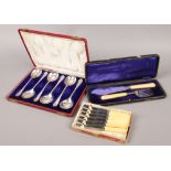 A Walker & Hall cased set of six silver plated soup spoons, along with cased fish servers and