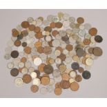 A collection of British and foreign pre decimal coins, to include silver examples