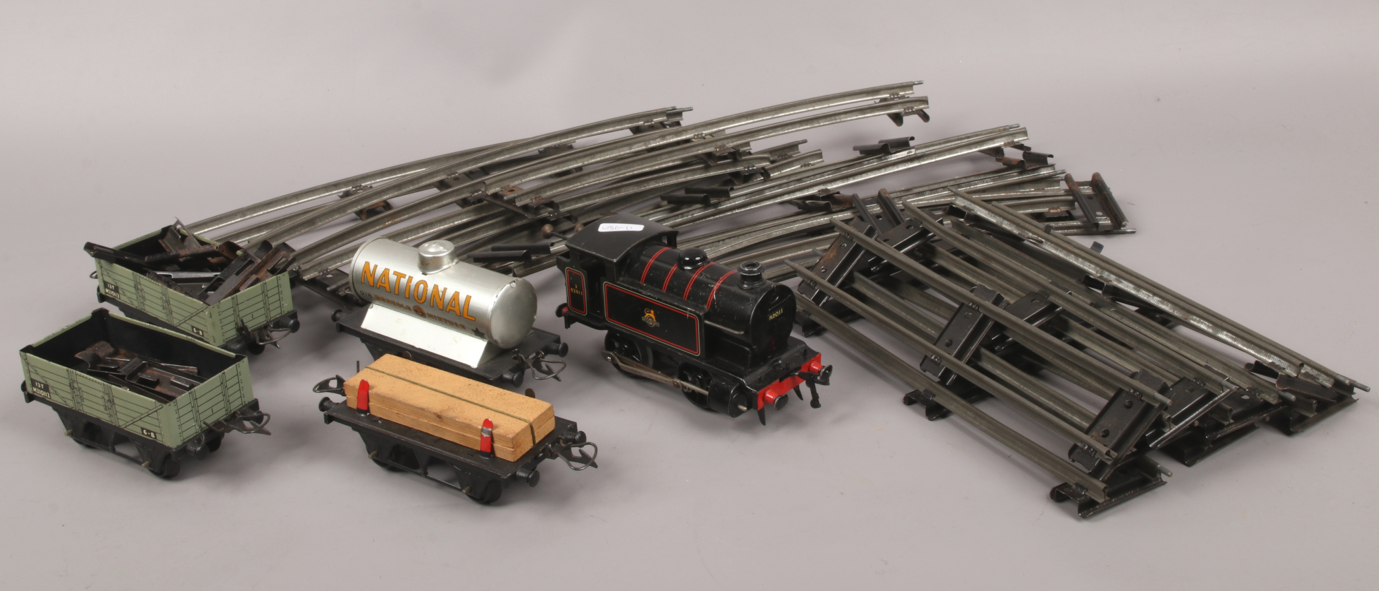 A Hornby Type 40 o gauge clock railway set to include track, engine and rolling stock.