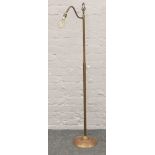 A Laura Ashley shadeless copper and brass Victorian style standard lamp with filament bulb.Condition