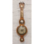 A Victorian banjo barometer with silvered dial, by Vannin Sheffield