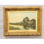 A gilt framed oil on canvas rural village landscape 'Sunset on the Thames' signature indistinct,