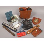 A group lot of collectables to include AGFA bellows pocket camera, Kenko binoculars, cigarette